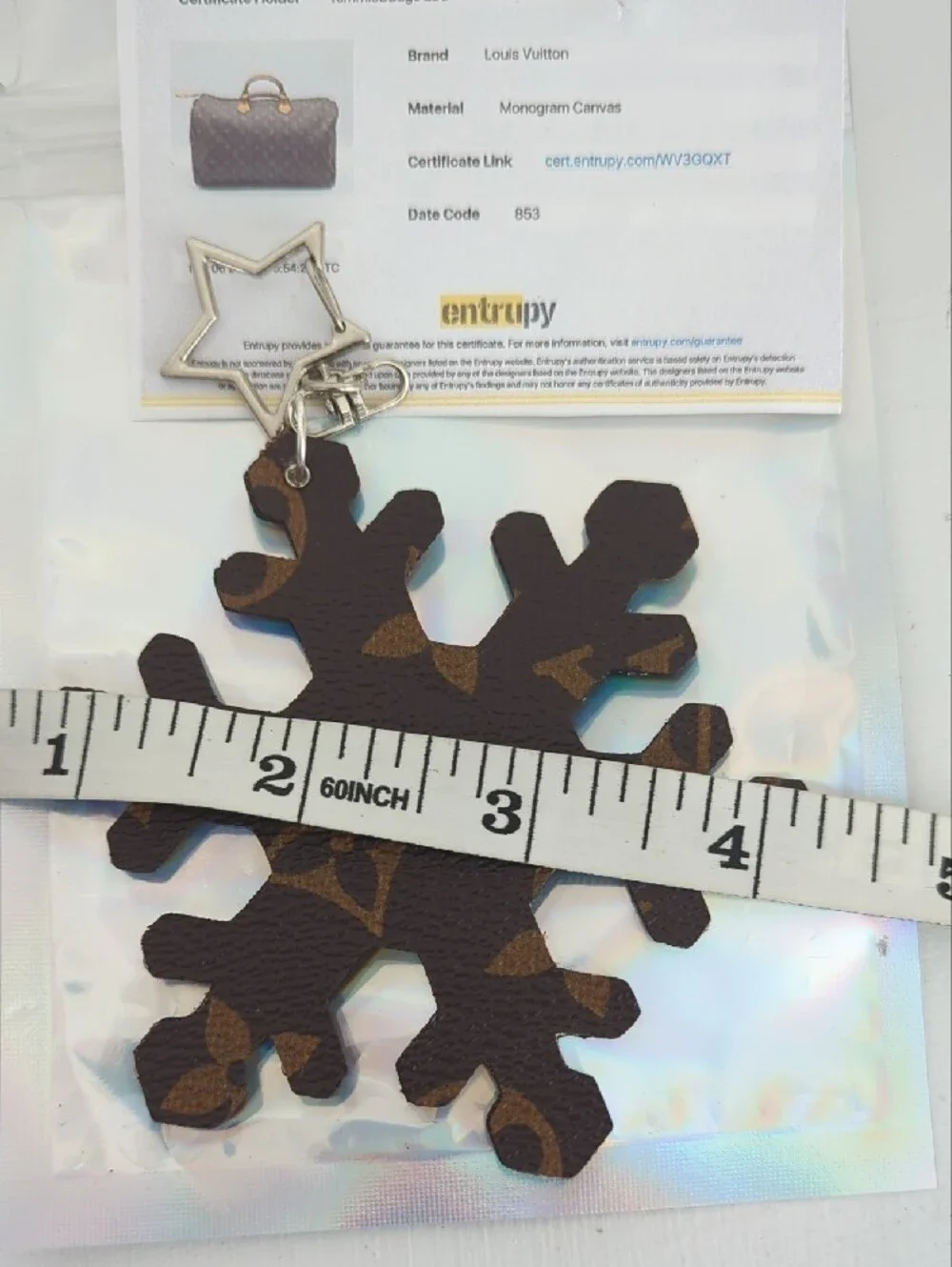 Louis Vuitton Brown Monogram Snowflake Key Charm with Silver Star Clasp COA Incl